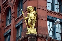 17-2 Gilded Statue By Sculptor Henry Baerer of Shakespeare Character Puck From A Midsummers Night Dream On The Puck Building 295-307 Lafayette St In Nolita New York City.jpg